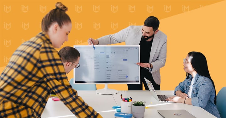 A marketing and sales team aligning on priorities for business growth