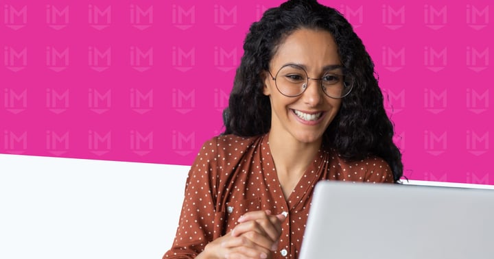 A woman looking at a business website's value proposition.