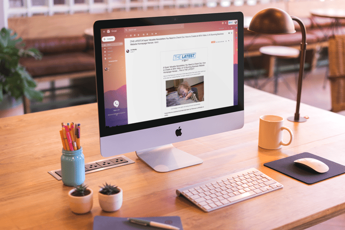 mockup-featuring-an-imac-set-up-on-a-beautiful-wooden-desk-a20415